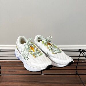 Nike Renew White and Yellow Athletic Shoes